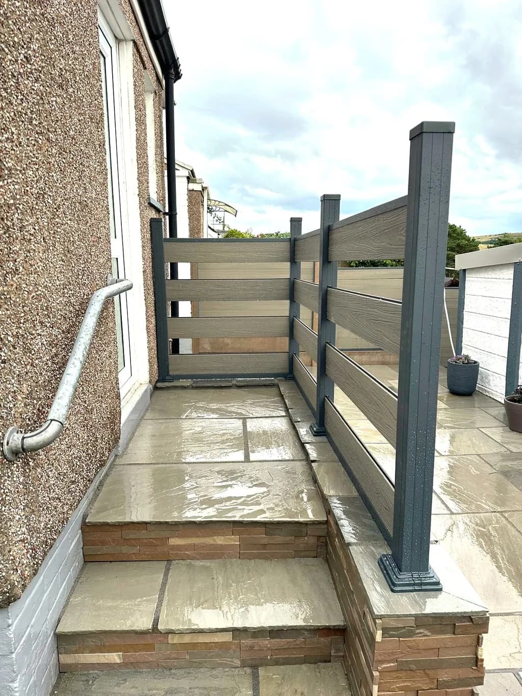 Split face clad steps with composite railing