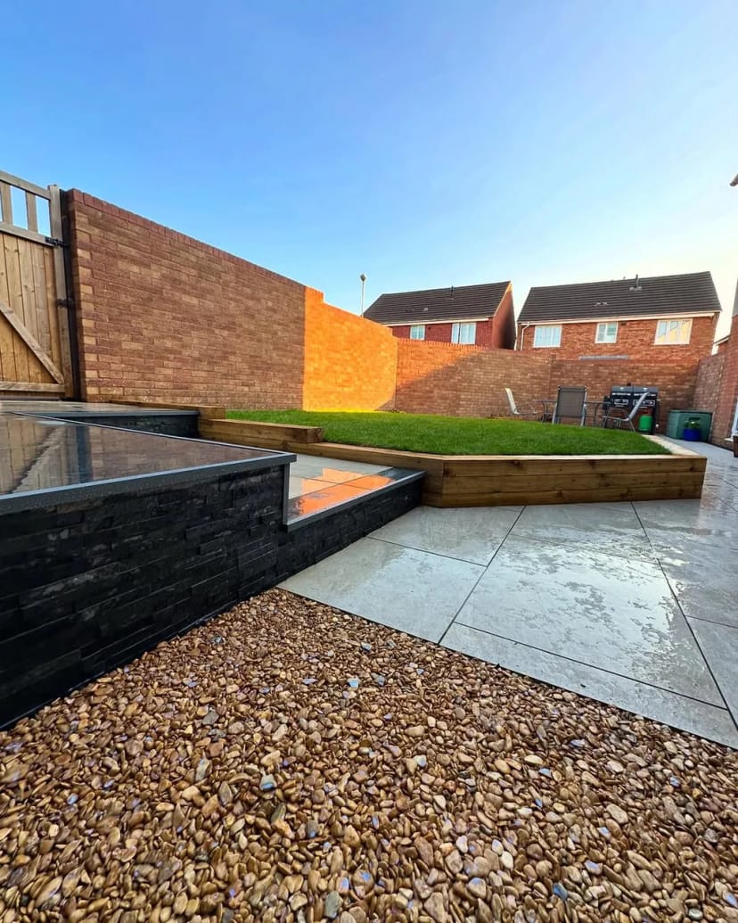 Full garden renovation using contrasting porcelain tiles