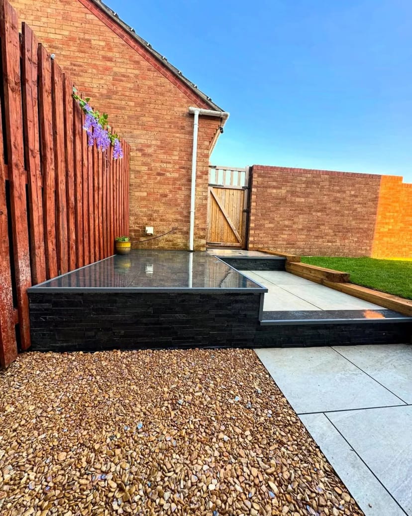 Full garden renovation using contrasting porcelain tiles