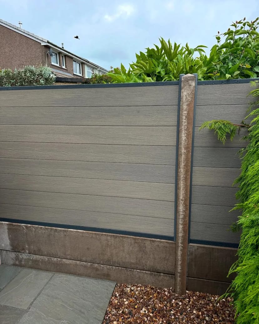 Indian sandstone patio with composite fencing