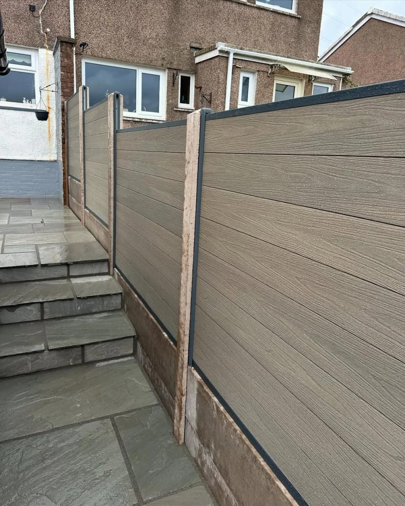 Indian sandstone patio with composite fencing
