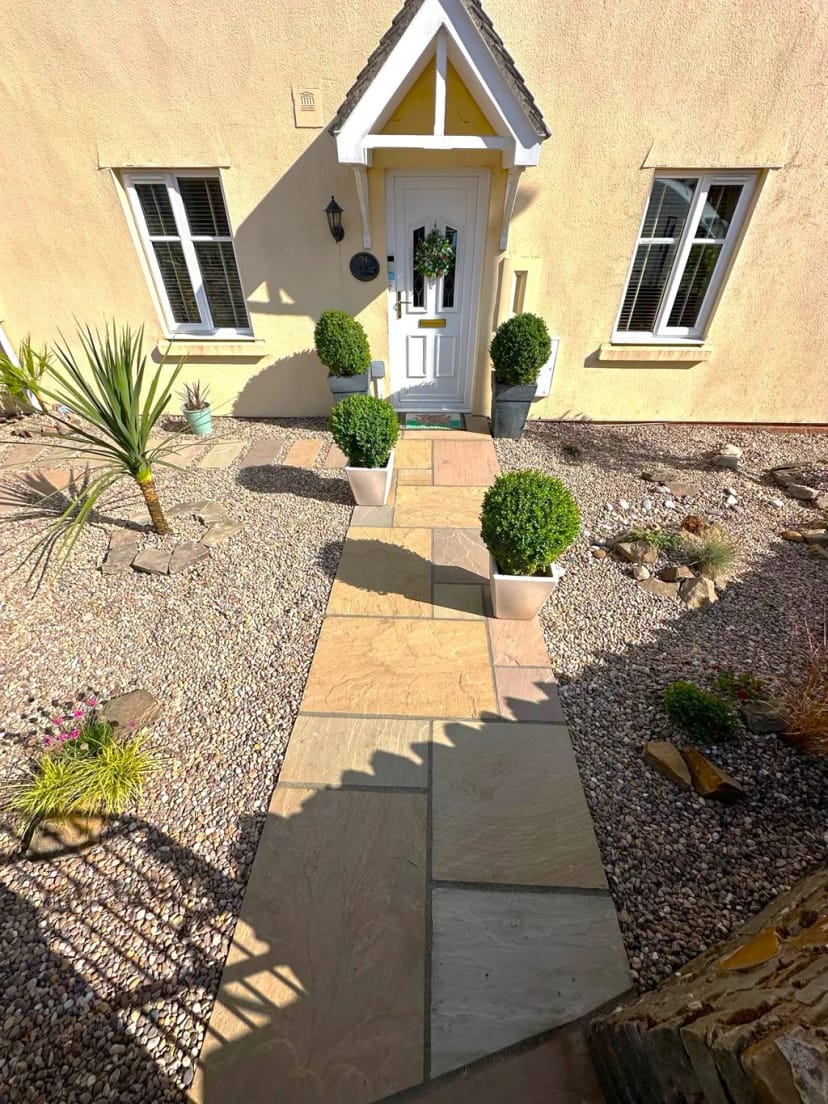 Rockery garden with sandstone paving