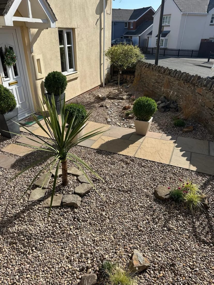 Rockery garden with sandstone paving